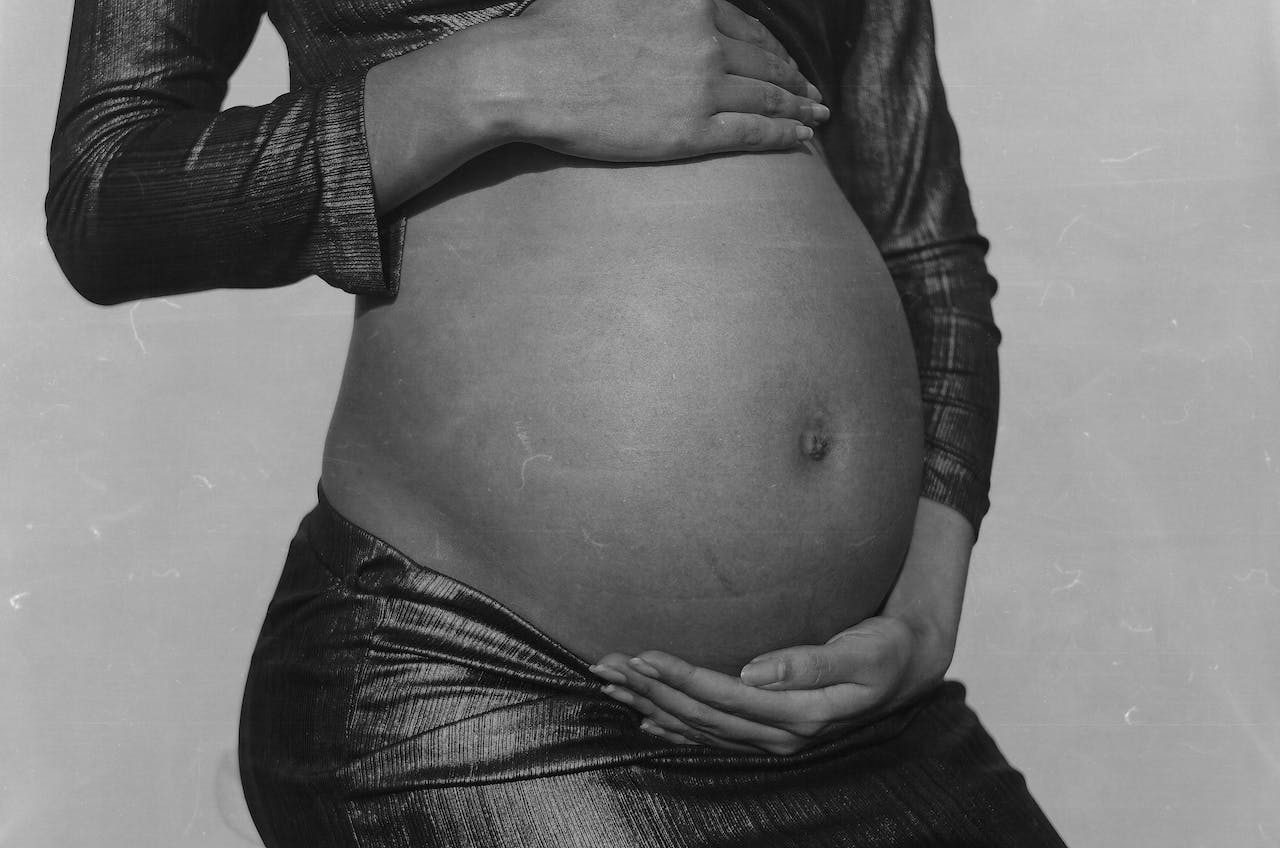 pregnant woman black and white photo